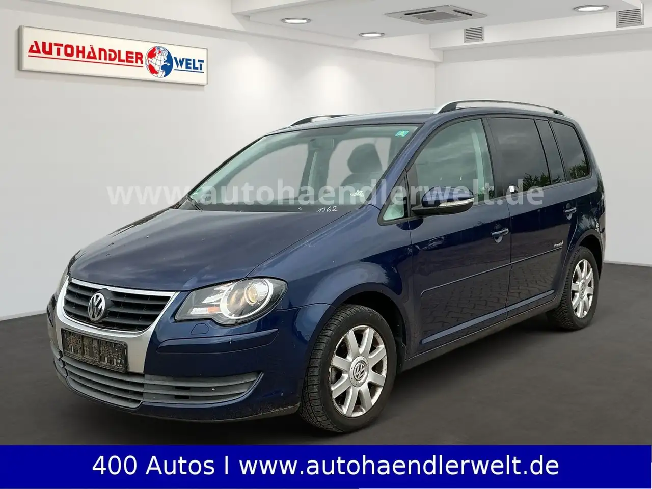 Volkswagen Touran 1.9 TDI Freestyle 7-Sitzer — photo 1 of 18