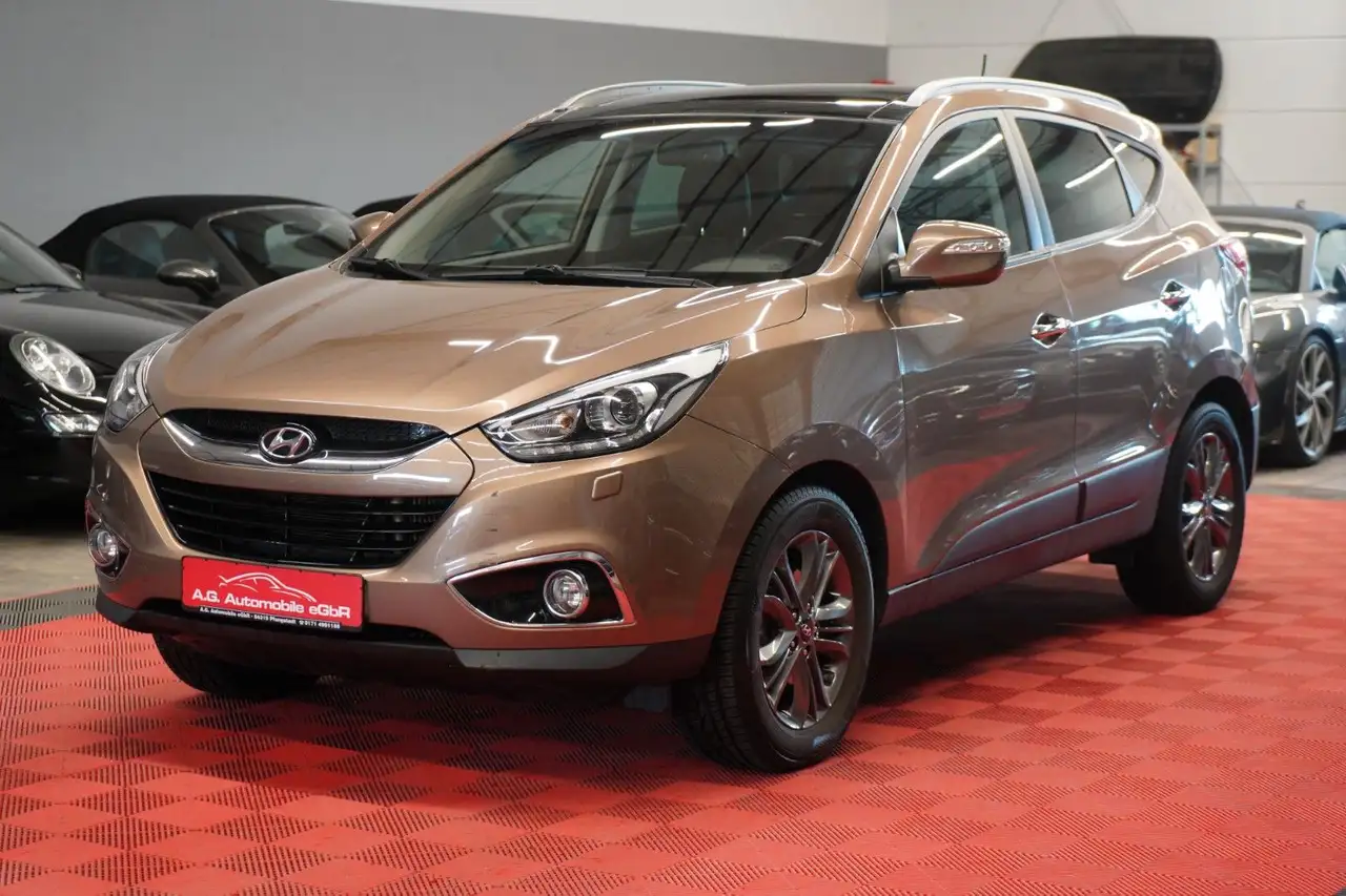 Hyundai iX35 2.0 CRDI AWD Aut. *1.Hand*Unfallfrei*Pano* — photo 1 of 29
