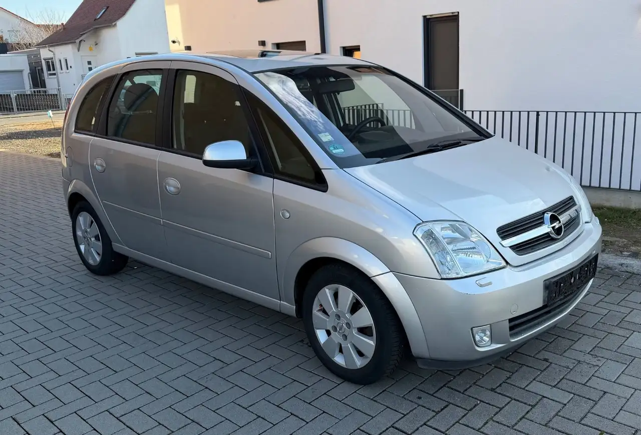 Opel Meriva 1.8 Cosmo Panorama Klima SHZ Alu — photo 1 of 11