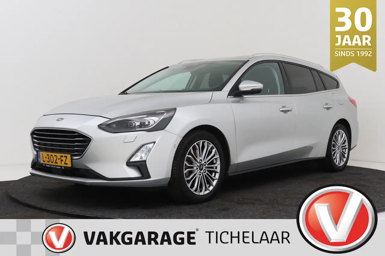Ford Focus Wagon 1.0 EcoBoost Titanium | Trekhaak | Adap. Cru — photo 1 of 40