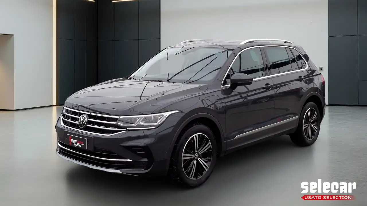 Volkswagen Tiguan II 2021 - Tiguan 1.4 tsi eh Elegance dsg — photo 1 of 15