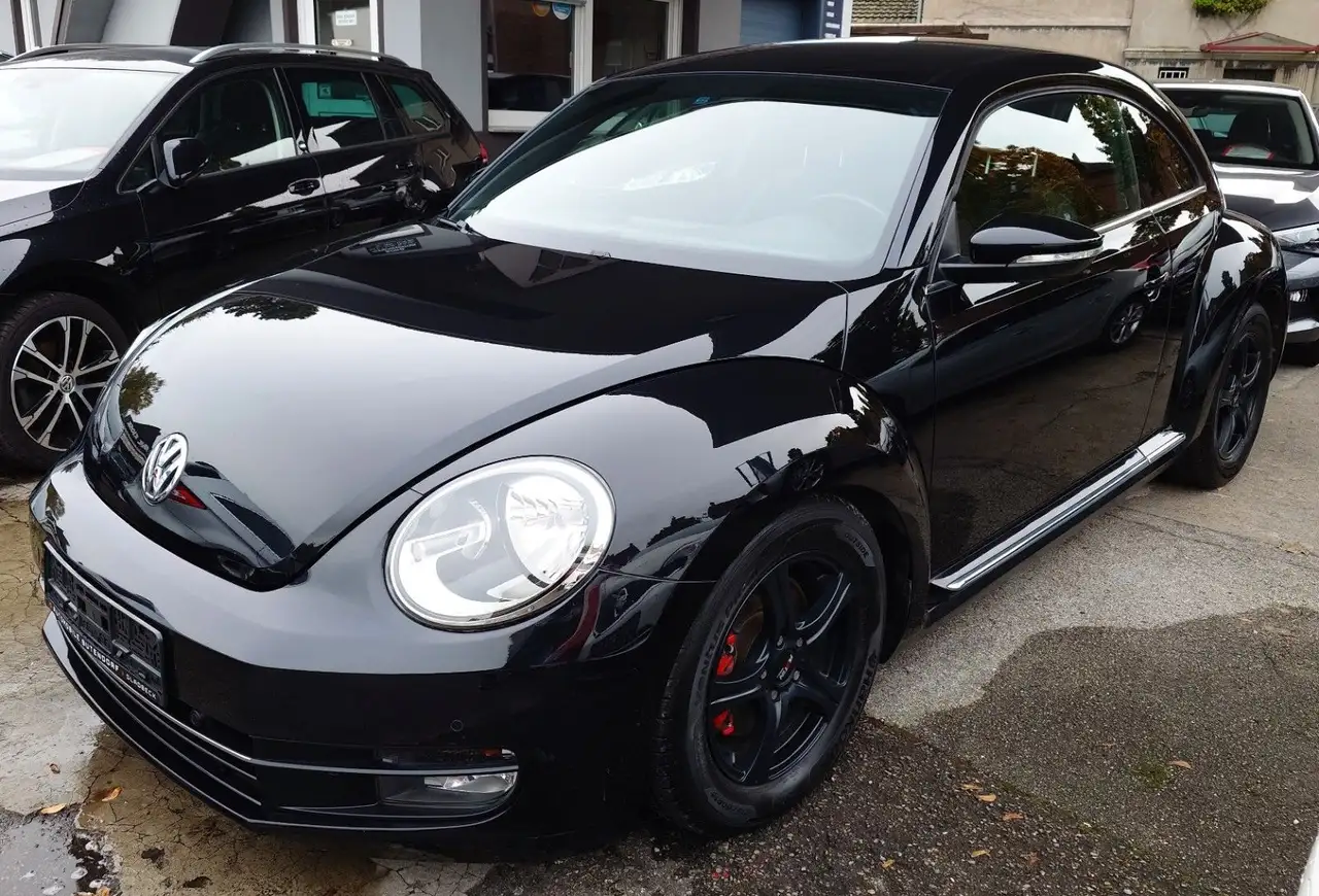 Volkswagen Beetle Sport 2.0 TSI DSG/TEMPOMA/SHZ/ANDROID/APPLECARPLAY/SCHECKHEFTGEPFLEGT — photo 1 of 12