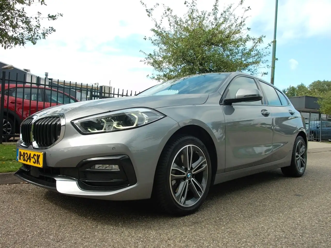 BMW 118 1-Serie (F40) 118i 136pk Aut Business Edition Plus — photo 1 of 40