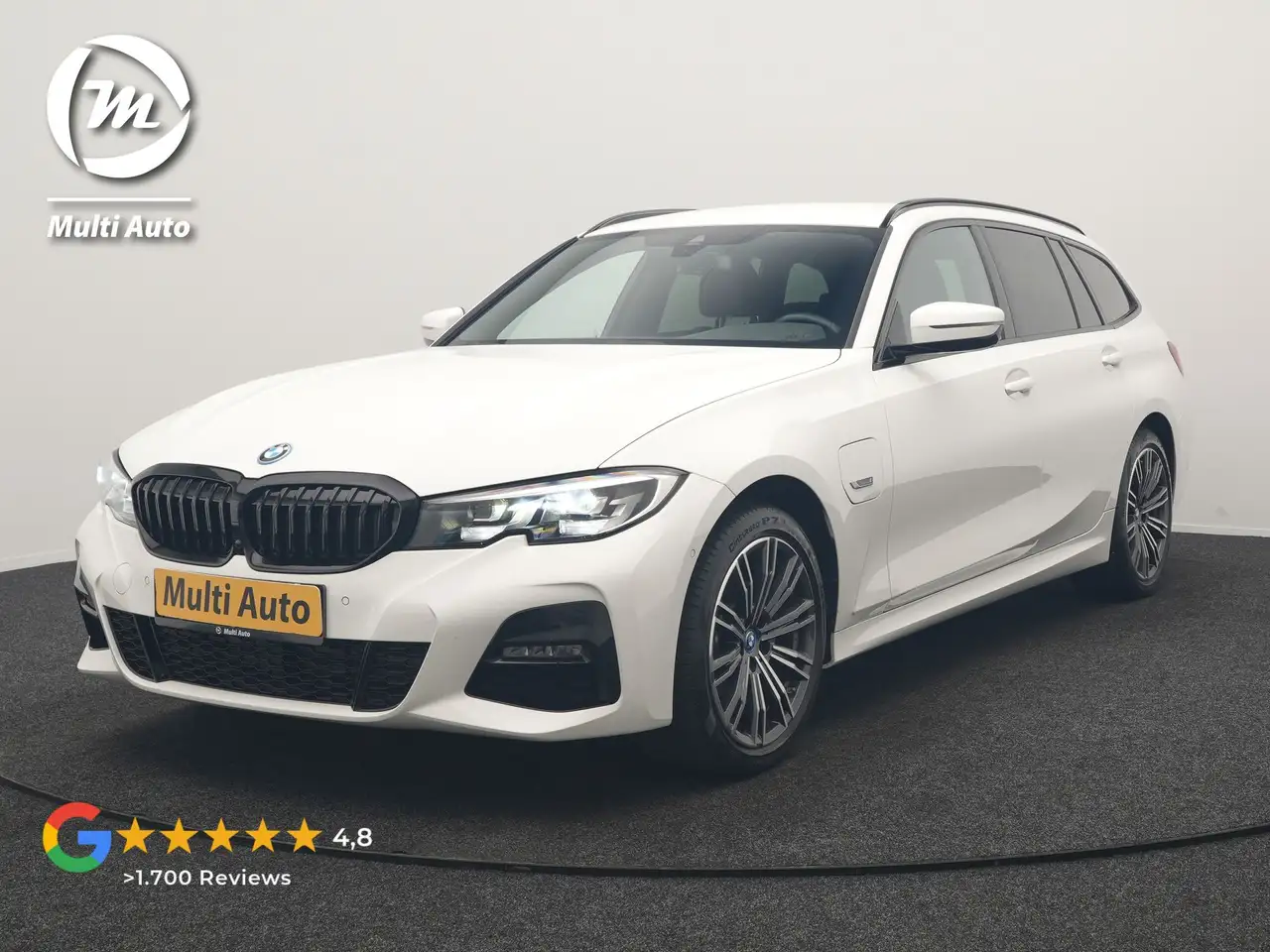 BMW 320 3-serie Touring 320e xDrive M Sport PHEV Dealer O. — photo 1 of 40