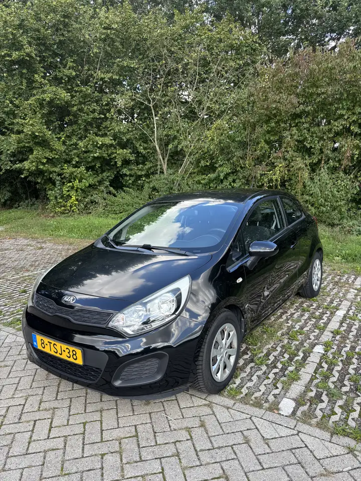 Kia Rio 1.2 CVVT ComfortL. — photo 1 of 15