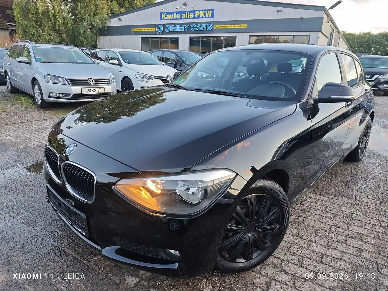 BMW 114 i Sport Line — photo 1 of 13
