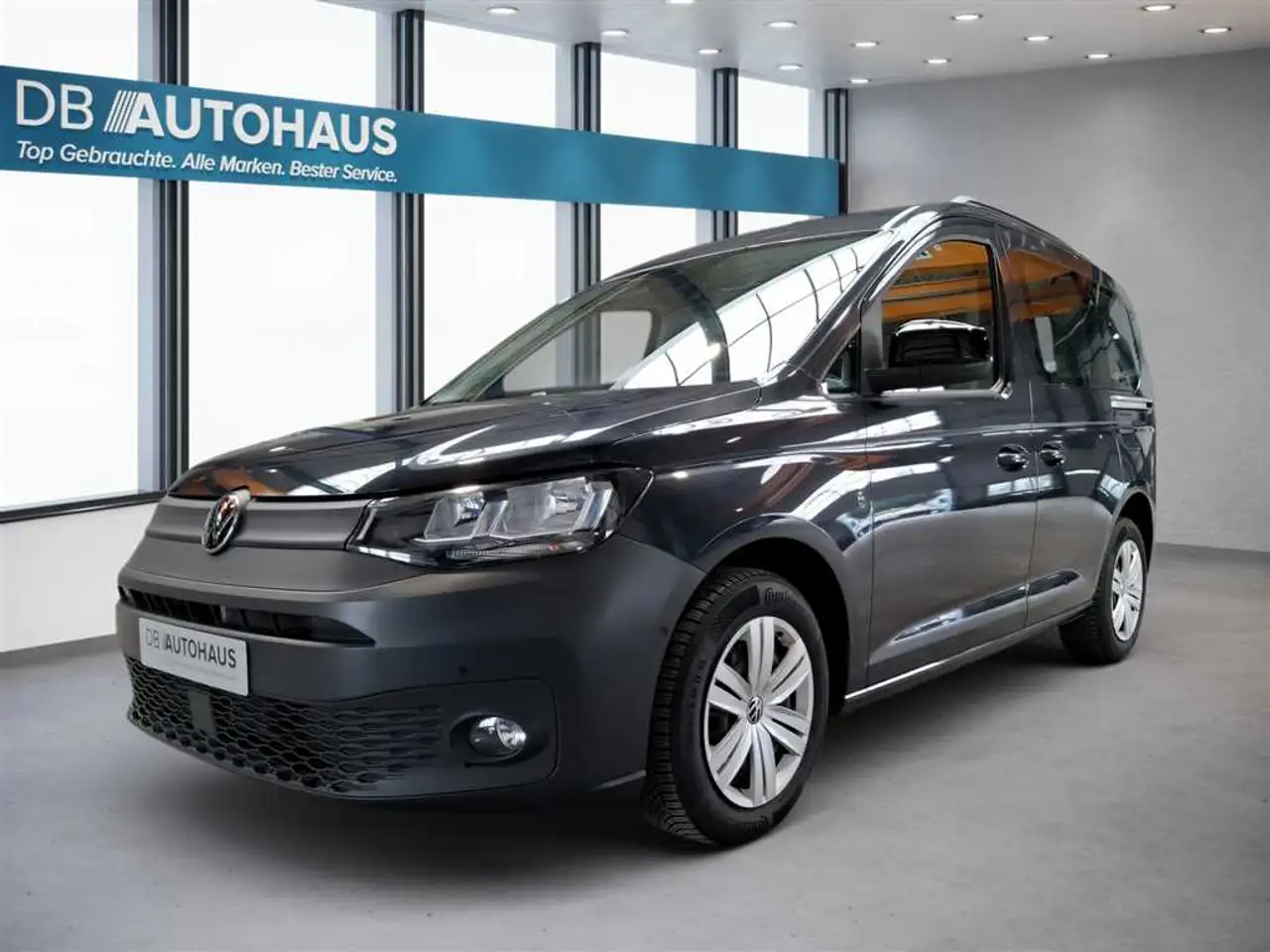 Volkswagen Caddy 2.0 TDI — photo 1 of 15
