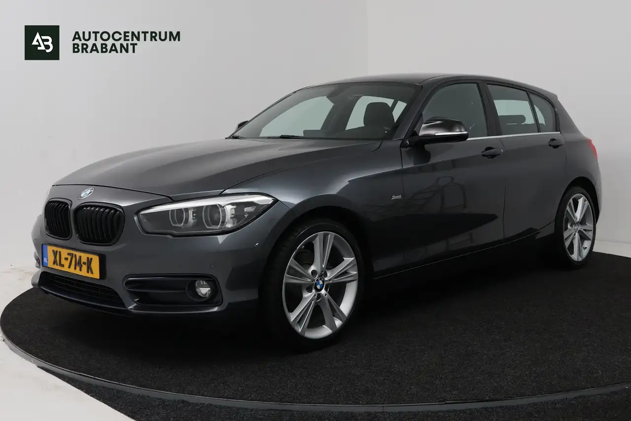 BMW 118 1-serie 118i Executive (NAVIGATIE, CAMERE, SPORTST — photo 1 of 24