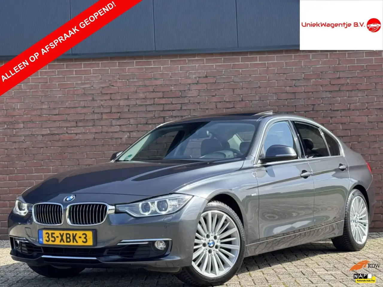 BMW 320 3-serie 320i EXECUTIVE | NL-AUTO! | SCHUIFDAK! | N — photo 1 of 40