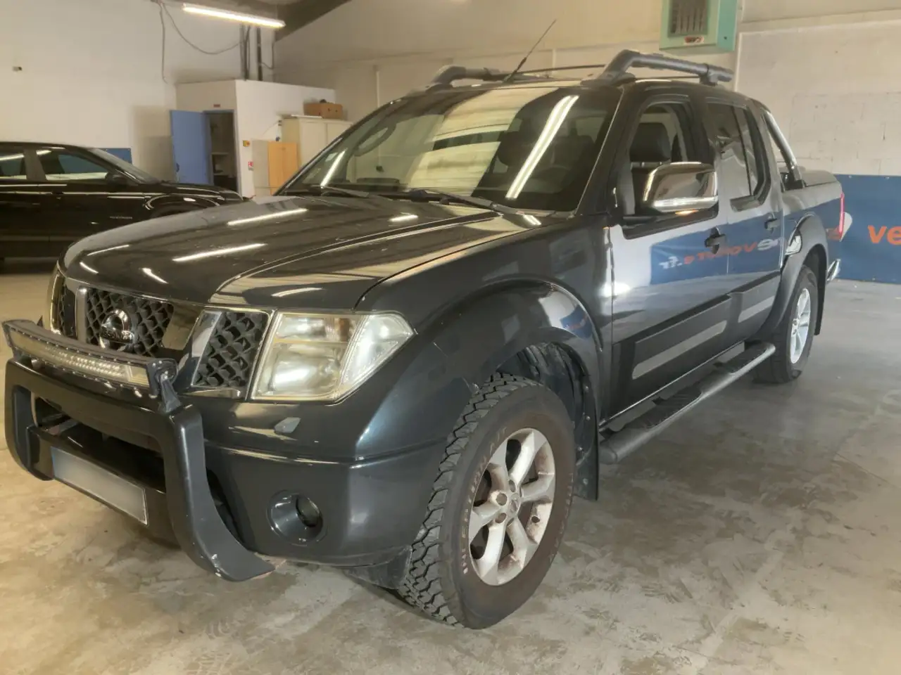 Nissan Navara 2.5 dCi 171 ch Double Cab Platinium A Gar 1 An — photo 1 of 15