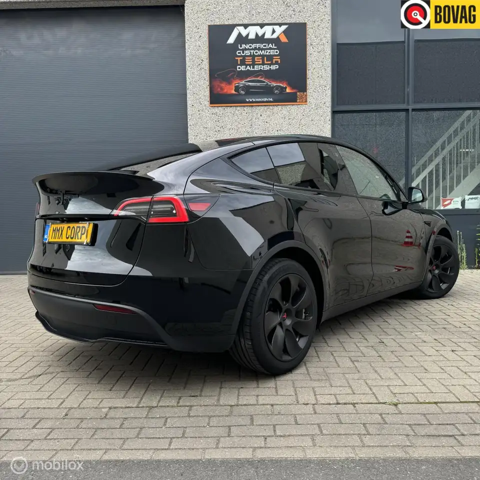 Tesla Model Y Long Range AWD + MMX PACK + IAP + TREKHAAK — photo 1 of 23