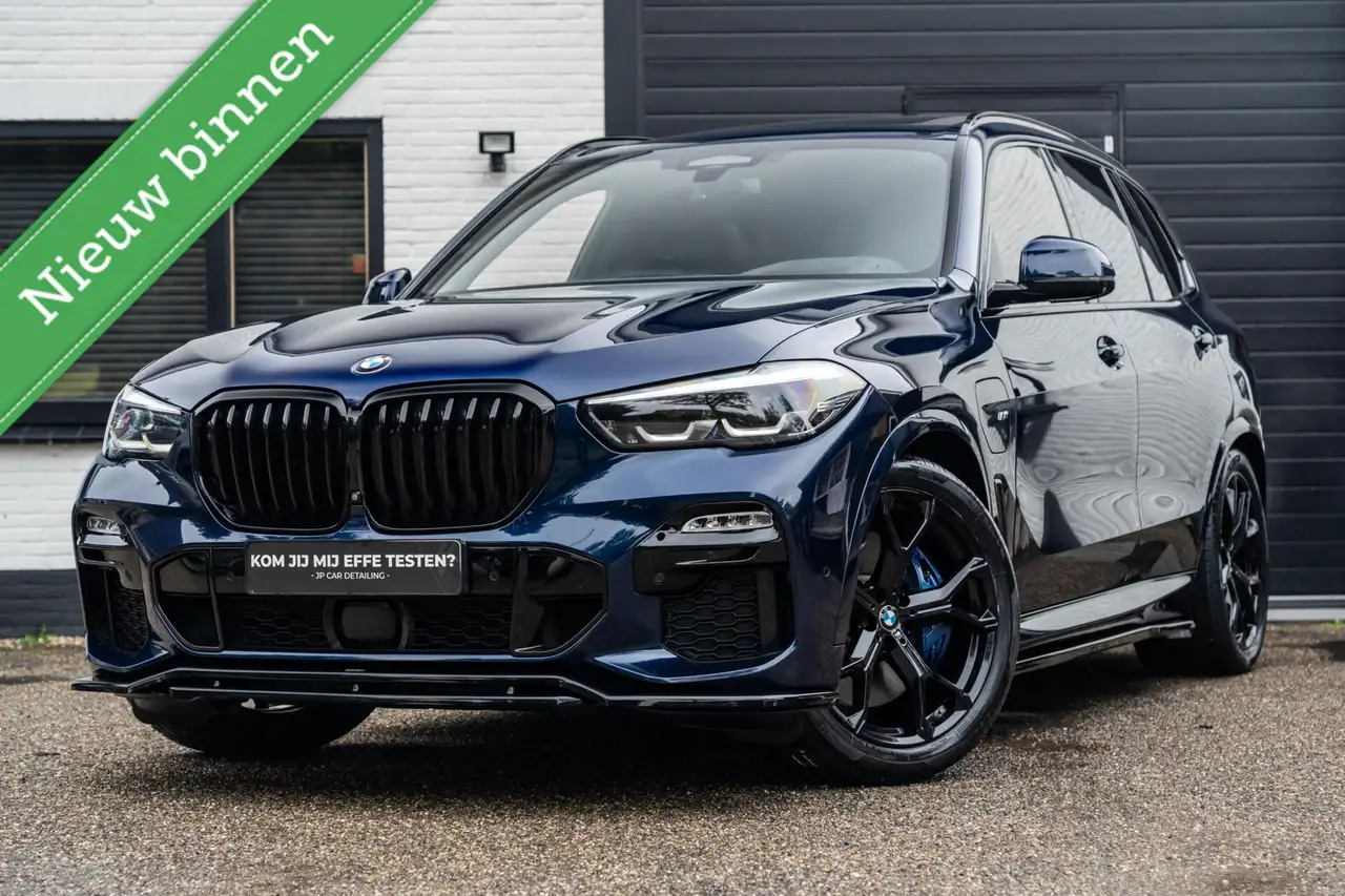 BMW X5 xDrive45e High Exec M H&K Sky Lounge Pano 360 Trek — photo 1 of 40