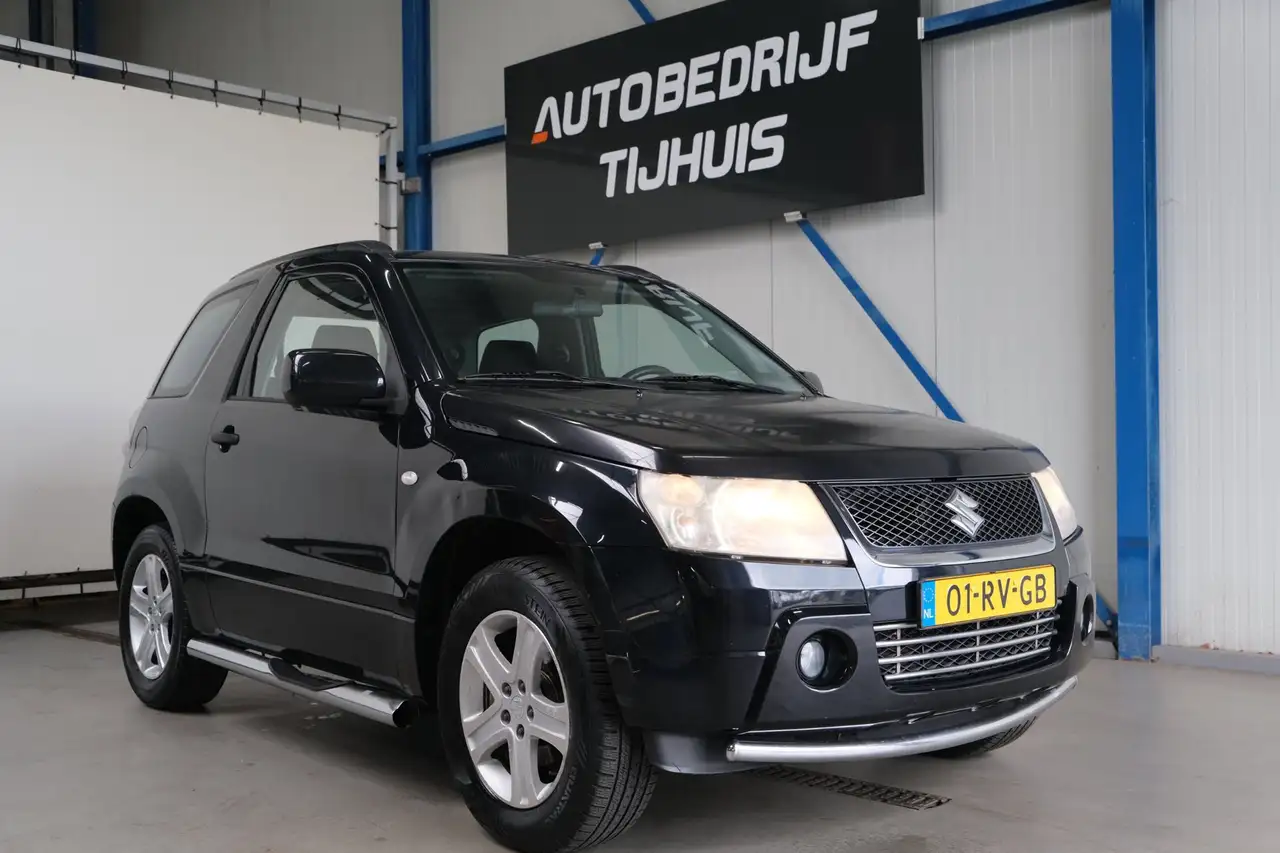 Suzuki Grand Vitara 1.6-16V Exclusive 4 WD — photo 1 of 28