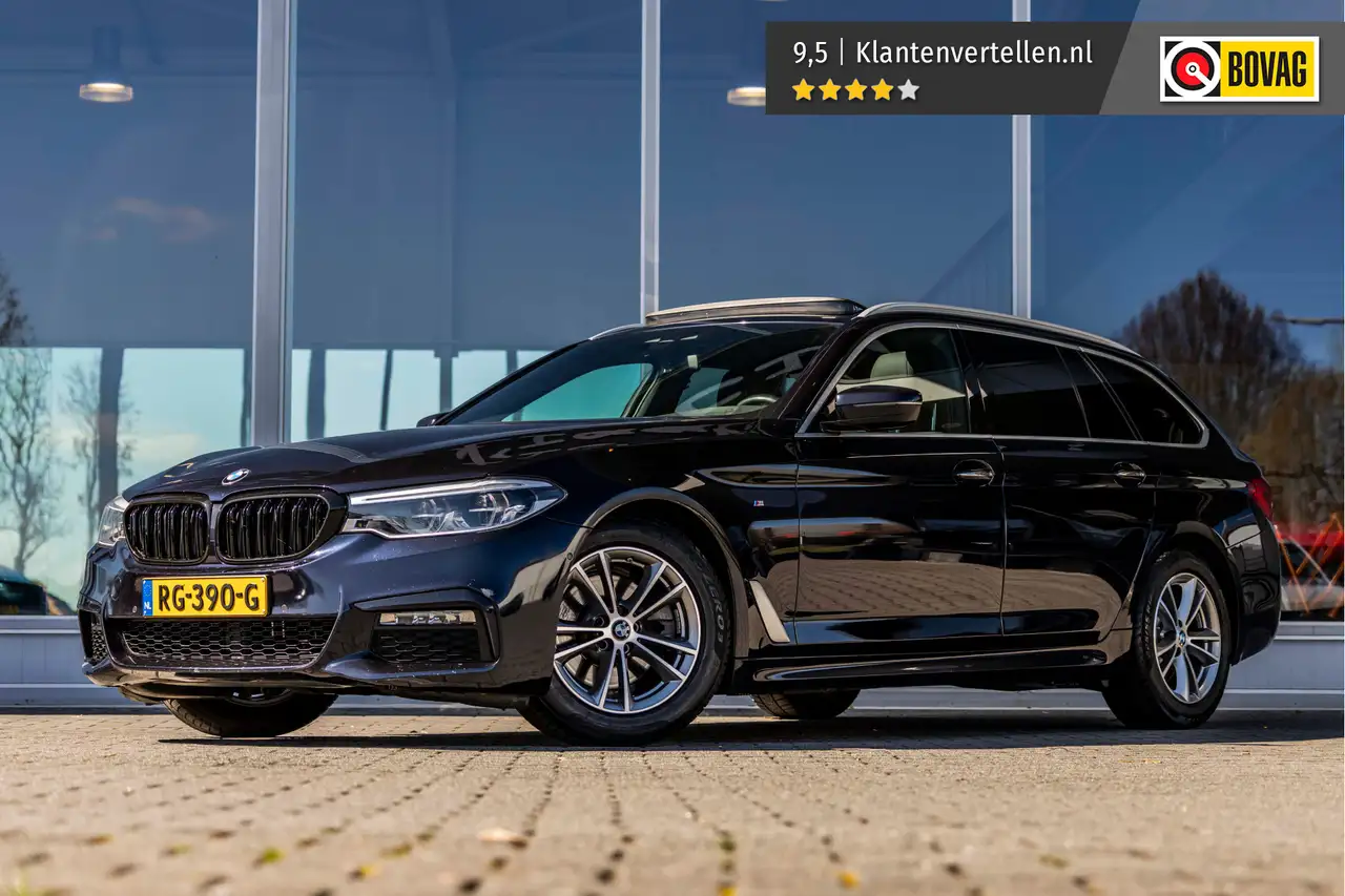 BMW 520 5-serie Touring 520i High Executive M-Sport | Pano — photo 1 of 38