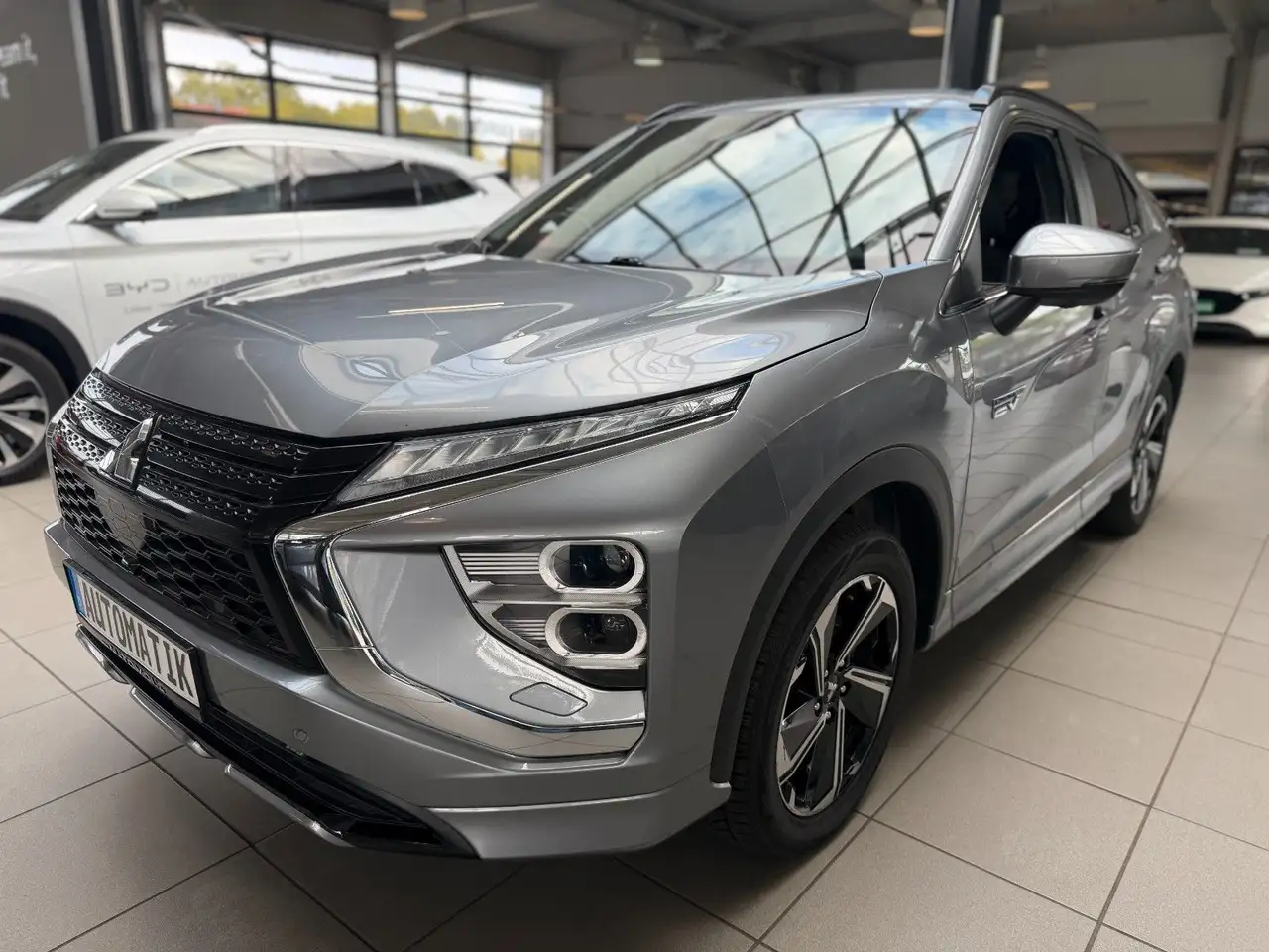Mitsubishi Eclipse Cross Plus Hybrid 4WD Automatik — photo 1 of 19