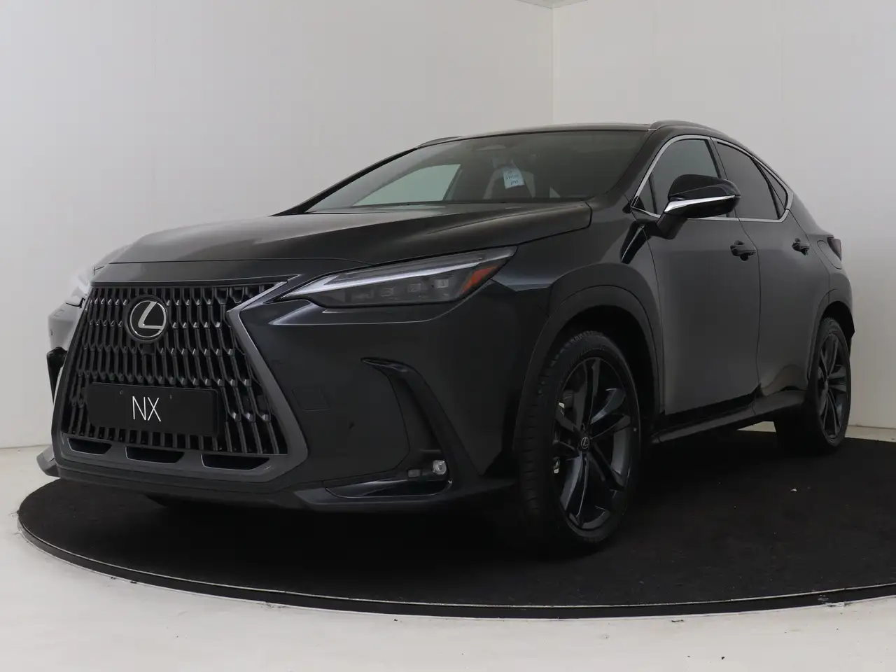 Lexus NX 450h+ AWD 35th Edition Trekhaak | 360 Camera | 20" Velge — photo 1 of 40