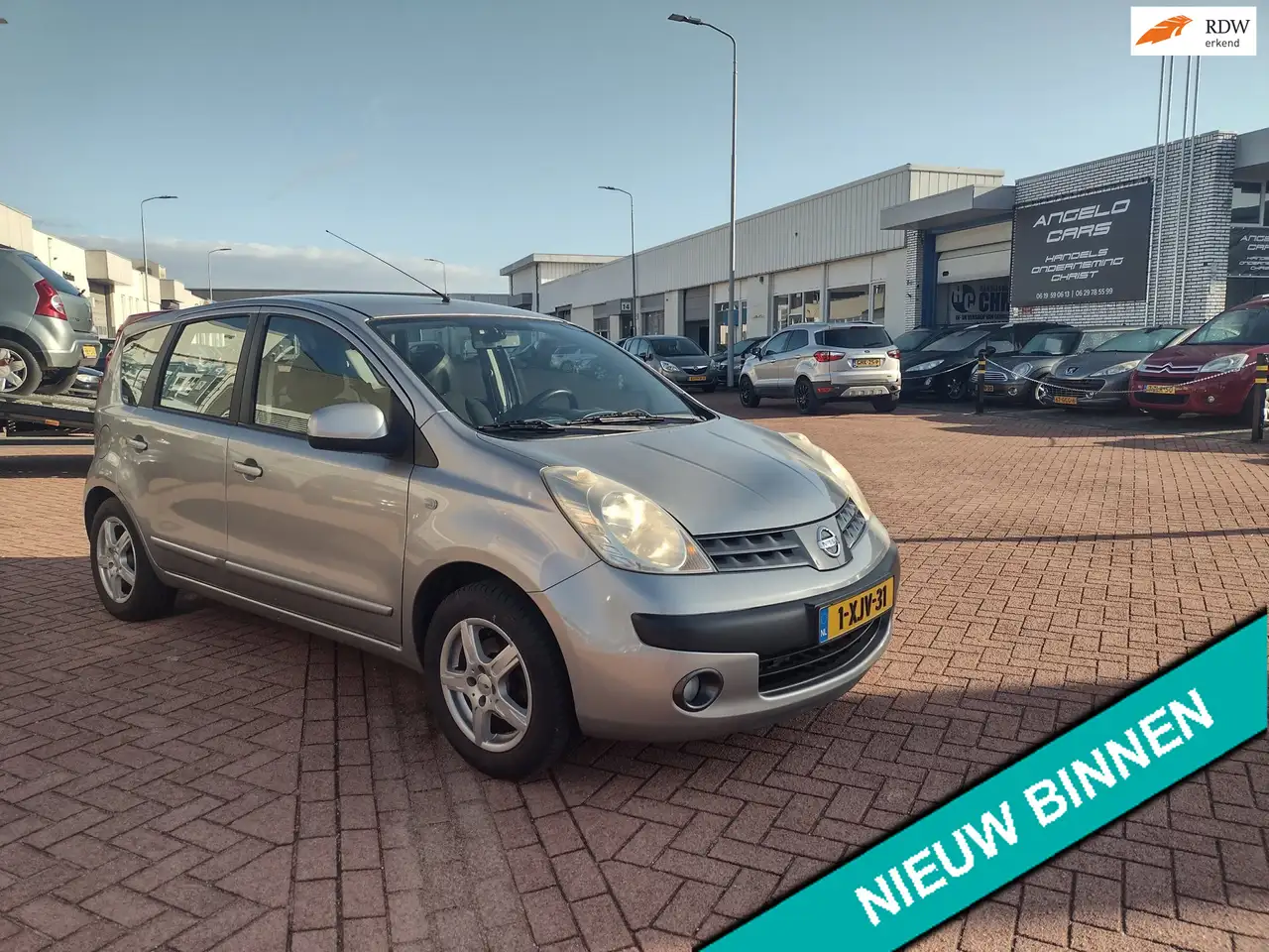 Nissan Note 1.4 Pure MOOIE AUTO AIRCO BEL 0619590613 5DRS HOGE — photo 1 of 10