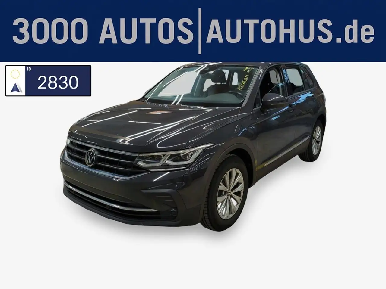 Volkswagen Tiguan — photo 1 of 16