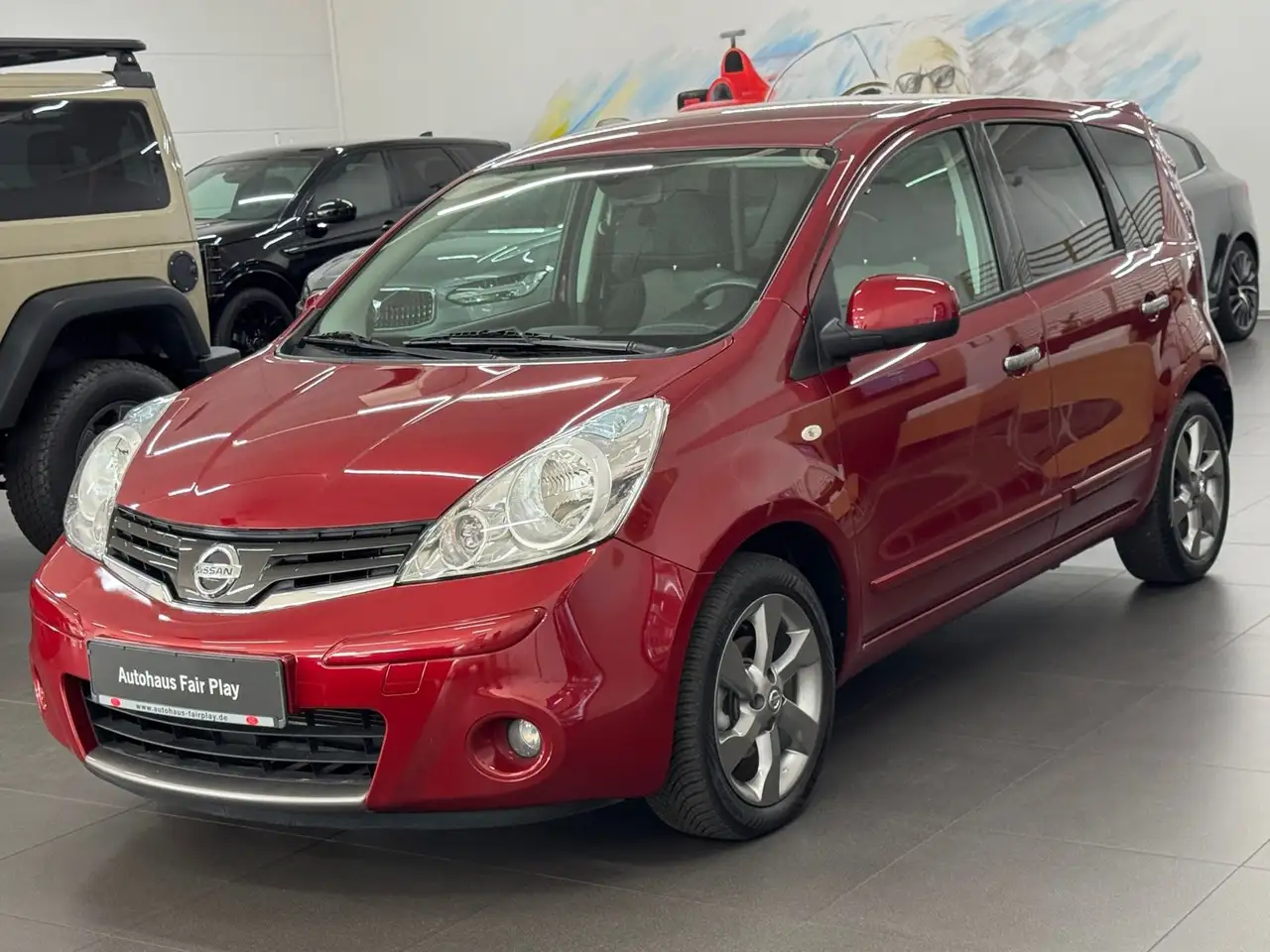 Nissan Note 1.6 Aut. PDC/NAVI/UNFALLFREI/1.HAND/TOP! — photo 1 of 17