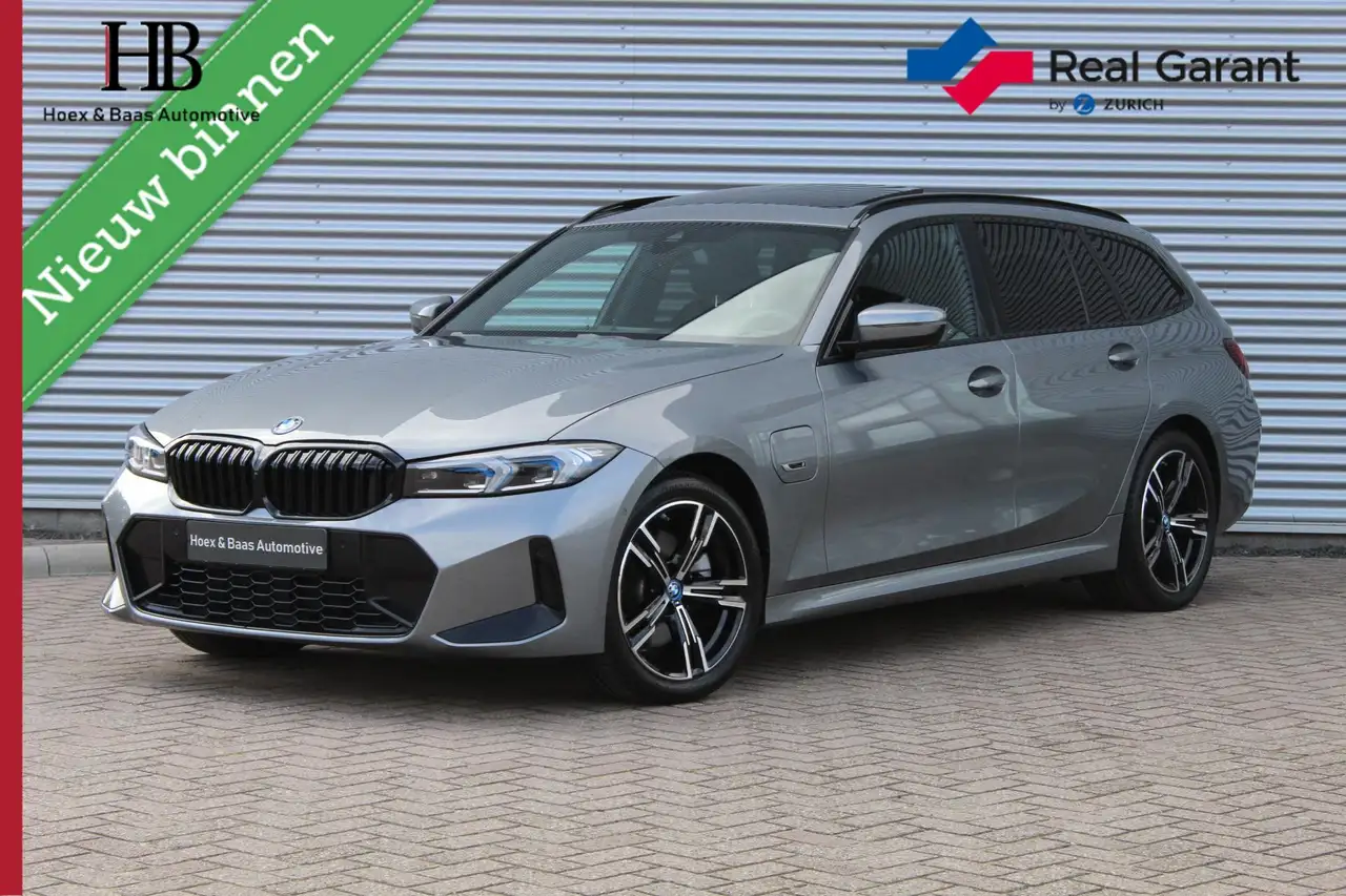 BMW 320 3-serie Touring 320e M-Pakket/Pano/Trekhaak/Camera — photo 1 of 40