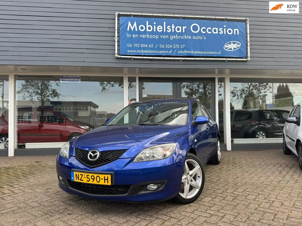 Mazda 3 Sport 1.6 Touring — photo 1 of 10