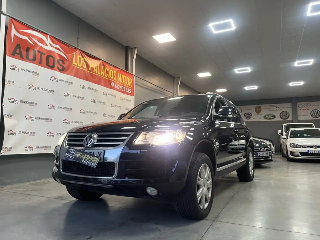 Volkswagen Touareg 2.5TDI R5 +Motion Tiptronic — photo 1 of 40
