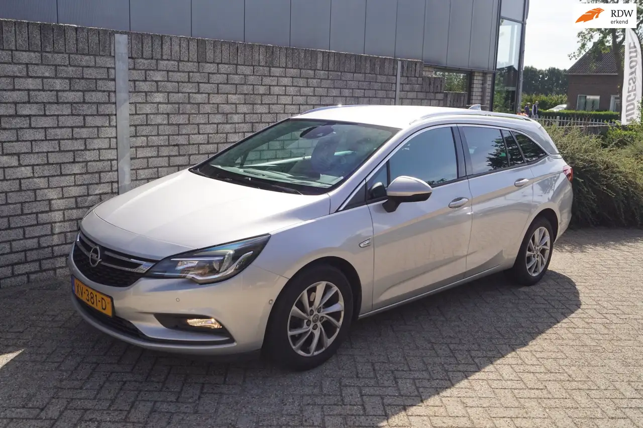 Opel Astra Sports Tourer 1.4 Innovation Half Leder Sportst St — photo 1 of 40