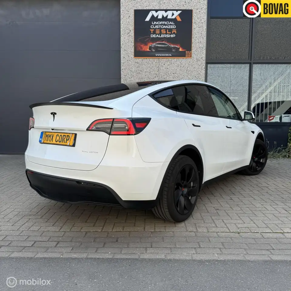 Tesla Model Y Long Range AWD + MMX PACK + TREKHAAK — photo 1 of 23