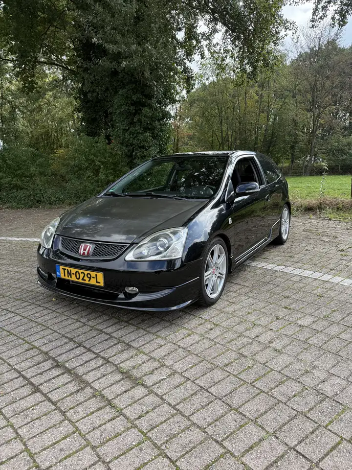 Honda Civic 1.6i Sport Unlimited — photo 1 of 14