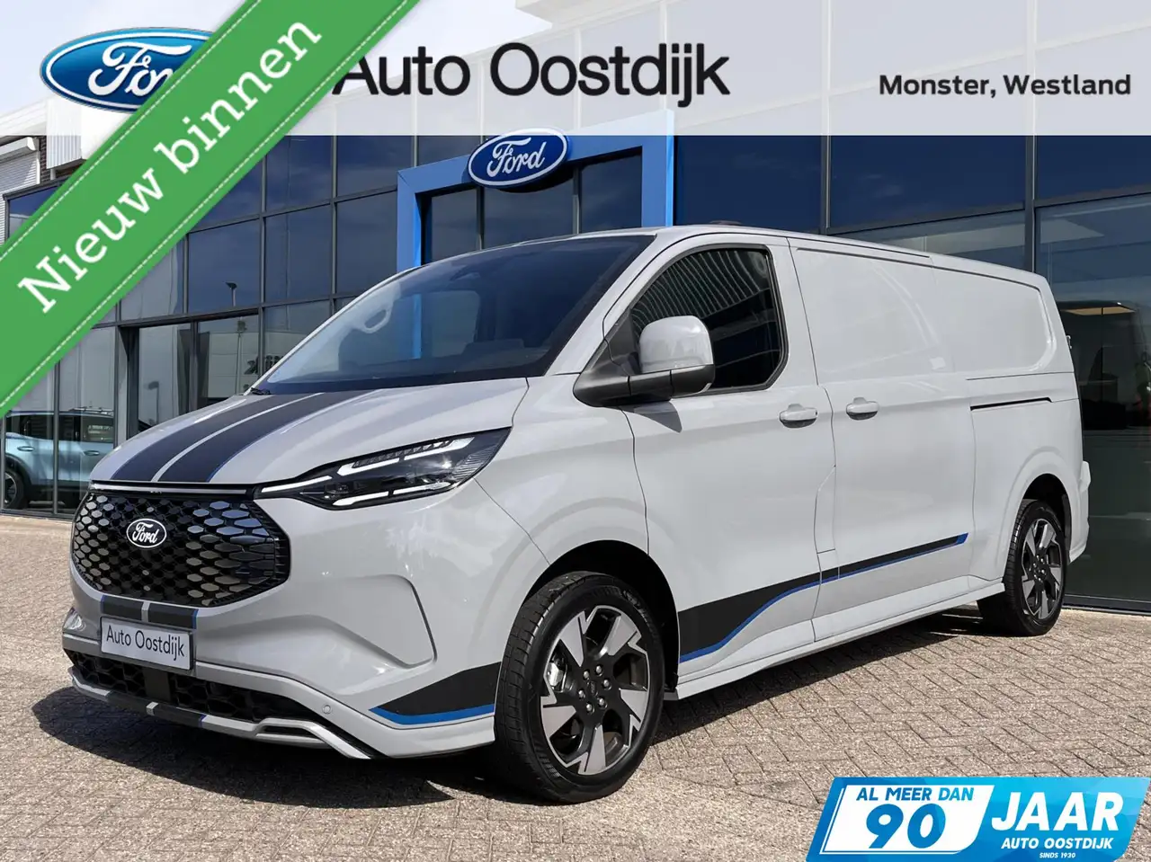 Ford Transit Custom E-Transit 340 L2H1 Sport 71 kWh 218PK 2x Schuifdeu — photo 1 of 27