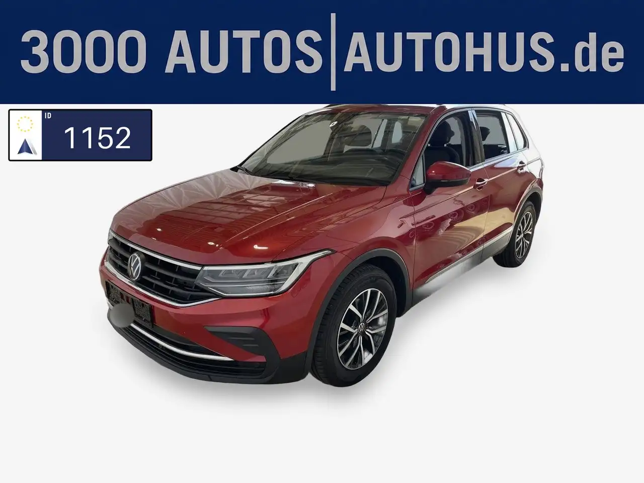 Volkswagen Tiguan — photo 1 of 16