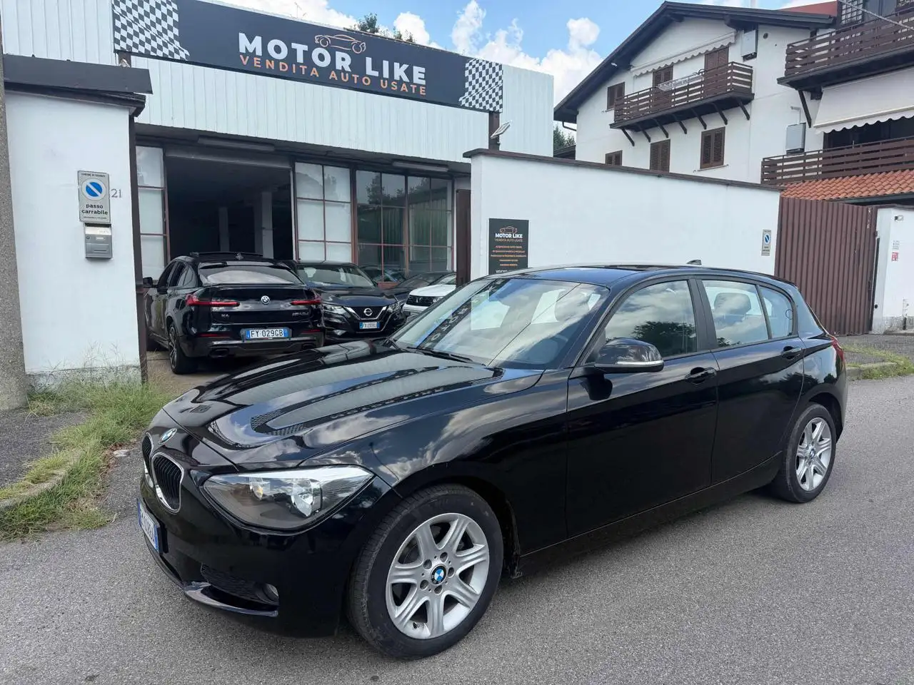 BMW 116 i 5p. — photo 1 of 12
