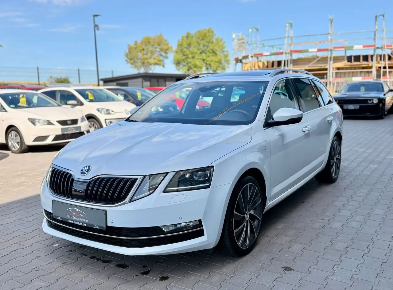 Skoda Octavia Combi 4x4 2.0 TDI DSG Pano Keyl. 2. Hand — photo 1 of 30