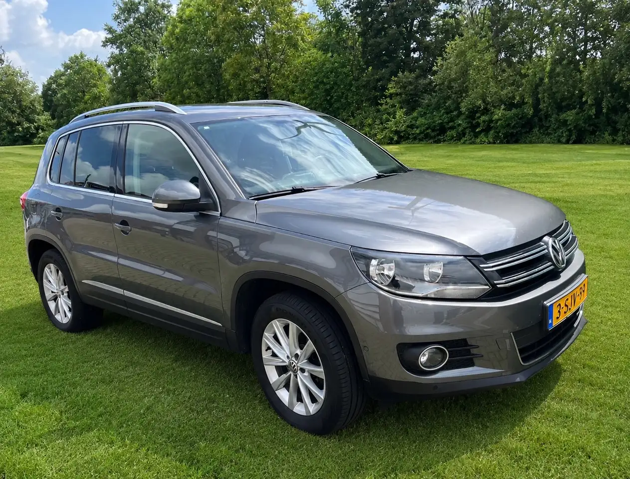 Volkswagen Tiguan 1.4 TSI Sport&Style — photo 1 of 9