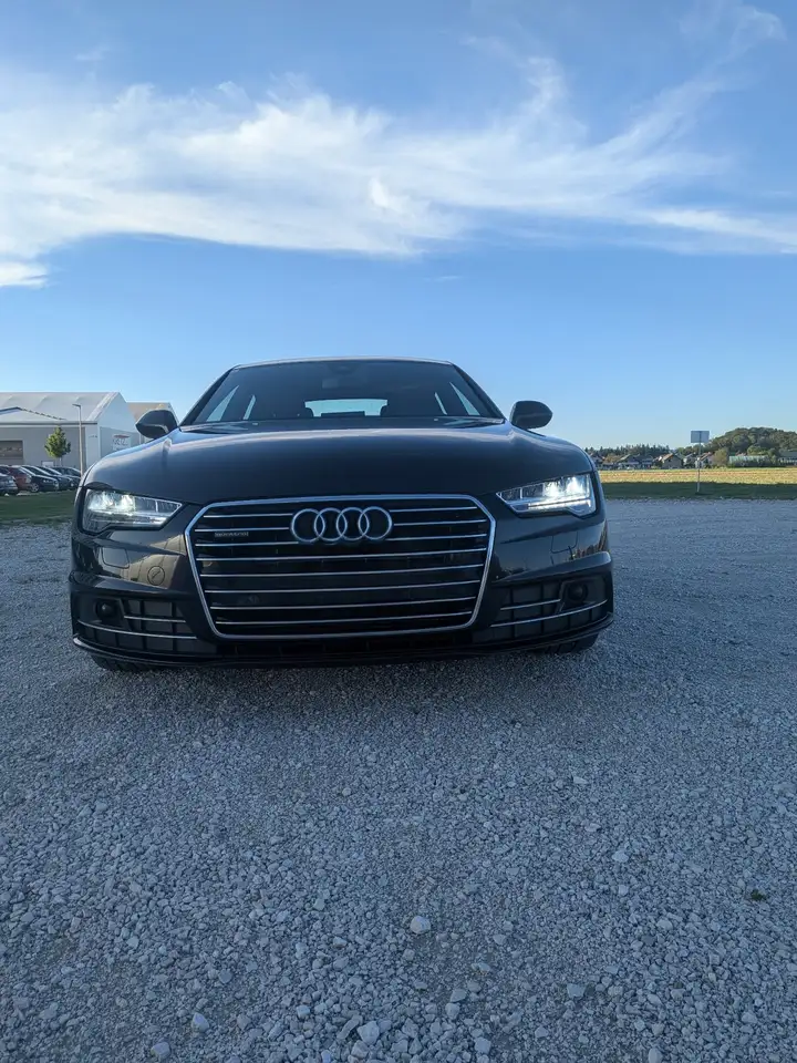 Audi A7 Sportback 3,0 TDI quattro S-tronic — photo 1 of 9
