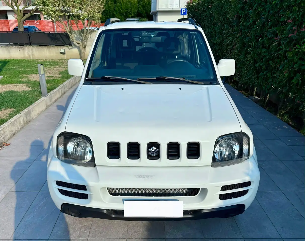 Suzuki Jimny 1.3 16v JLX 4wd GPL — photo 1 of 11