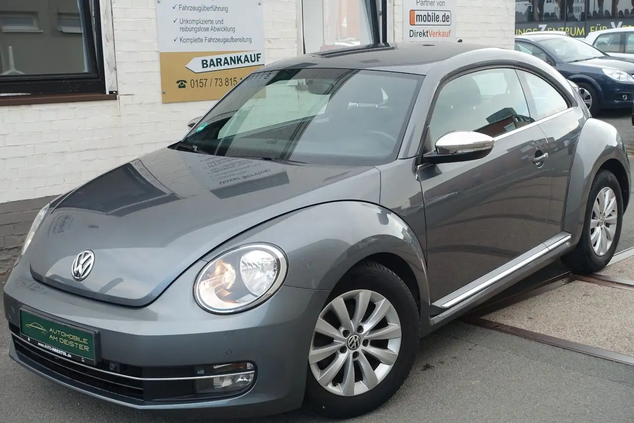 Volkswagen Beetle Lim. Design*NAVI*SHZ*PDC*TEMPOMAT*79.334K — photo 1 of 21