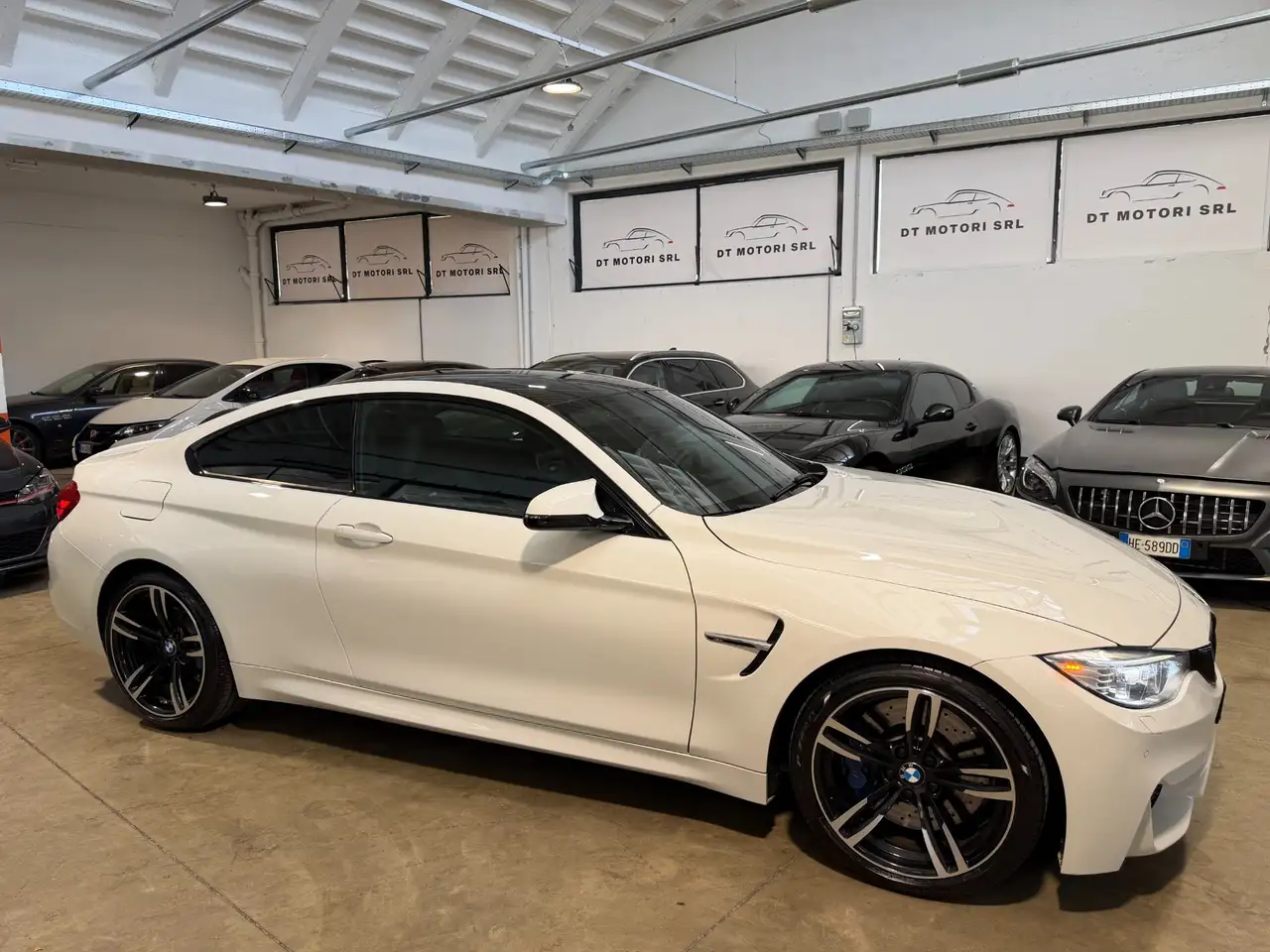BMW M4 3.0 DKG - CARBONIO - TAGLIANDI CERTIFICATI — photo 1 of 15