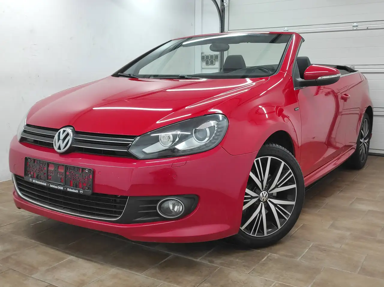 Volkswagen Golf Cabriolet 1.2 XENON NAVI KAMERA KLIMAA SHZ 6-GANG *BREMSE V+H+4XREIFEN NEU* ALLSTAR BMT — photo 1 of 40