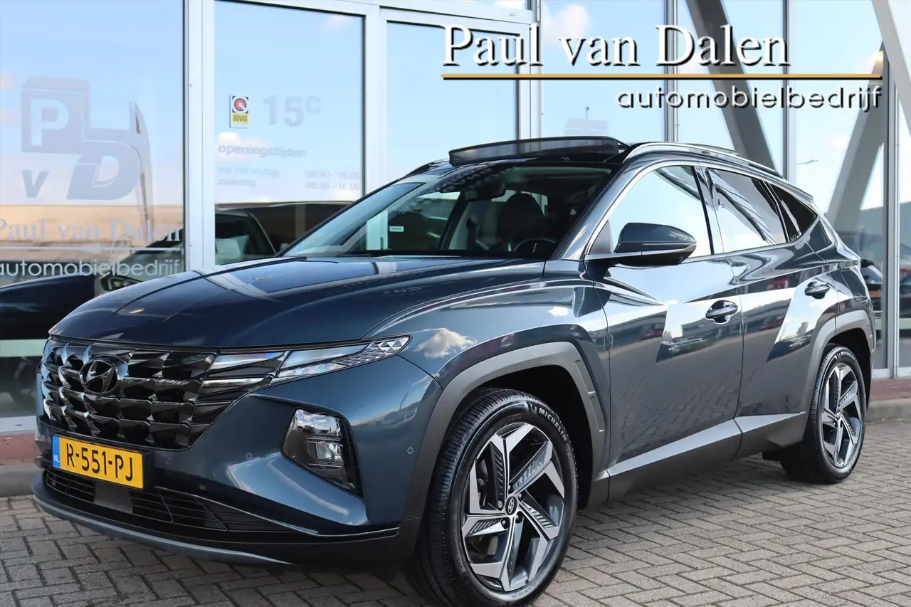 Hyundai TUCSON 1.6 T-GDi 230PK HEV PREMIUM SKY Panodak | Trekhaak — photo 1 of 40