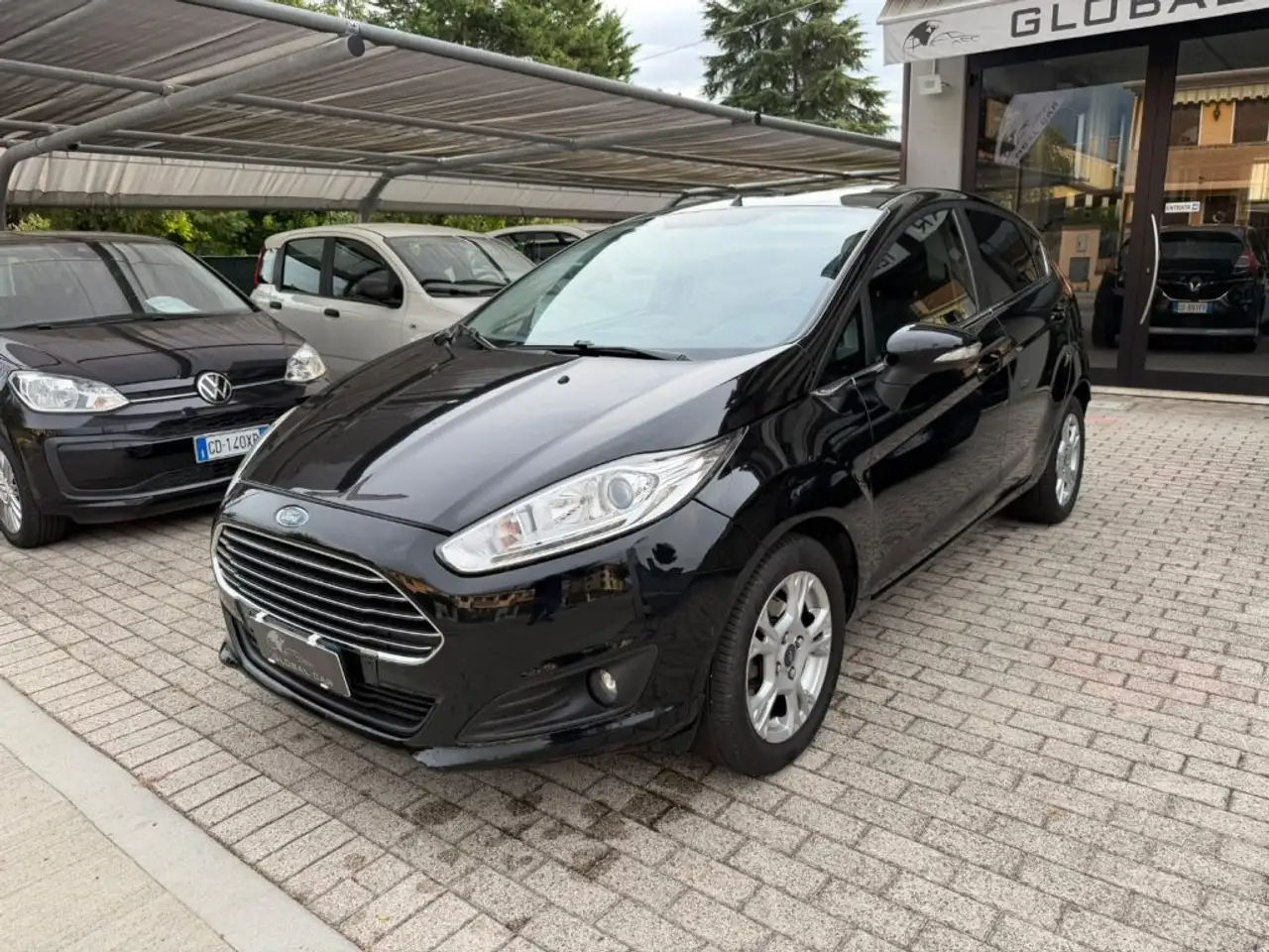 Ford Fiesta 1.4 5p. Bz.- GPL Titanium — photo 1 of 9