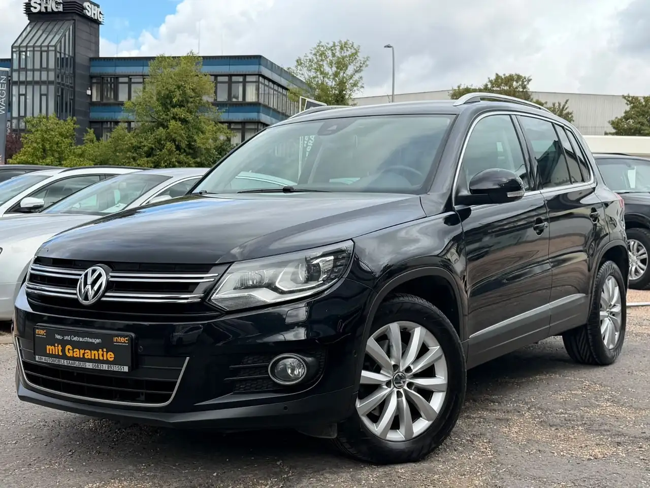 Volkswagen Tiguan Sport & Style BMT — photo 1 of 23