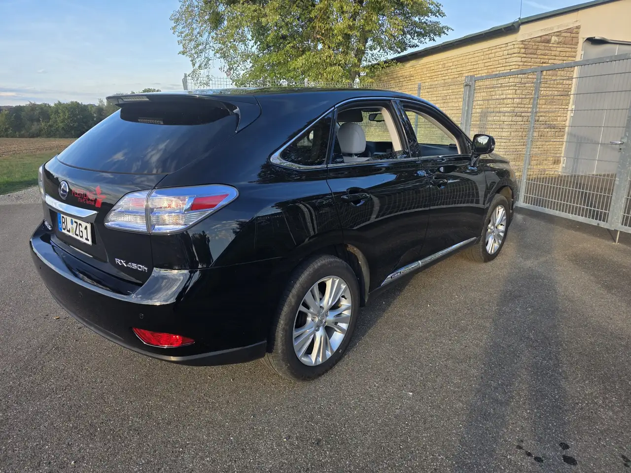 Lexus RX 450h (hybrid) — photo 1 of 20