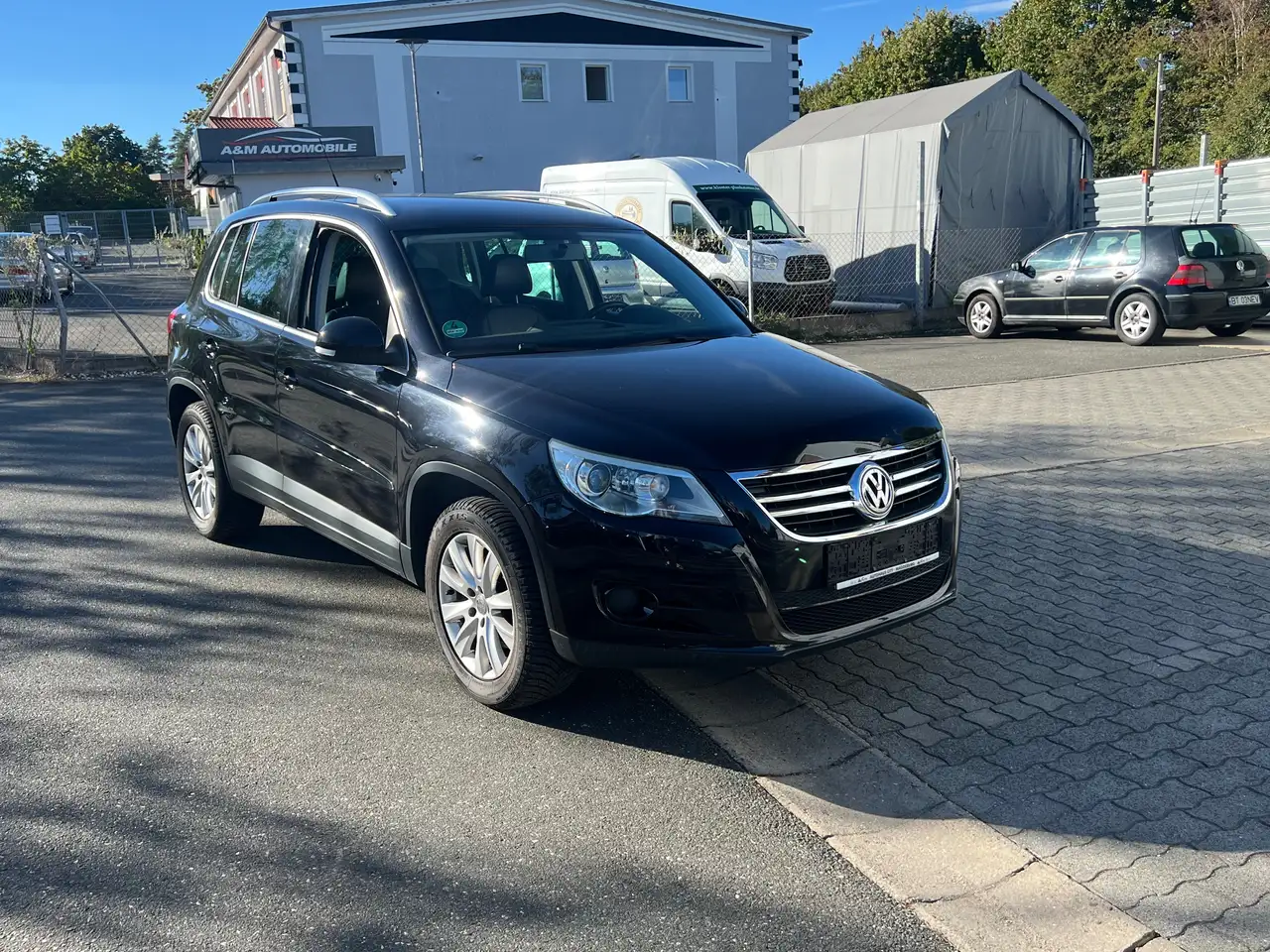 Volkswagen Tiguan Sport — photo 1 of 25