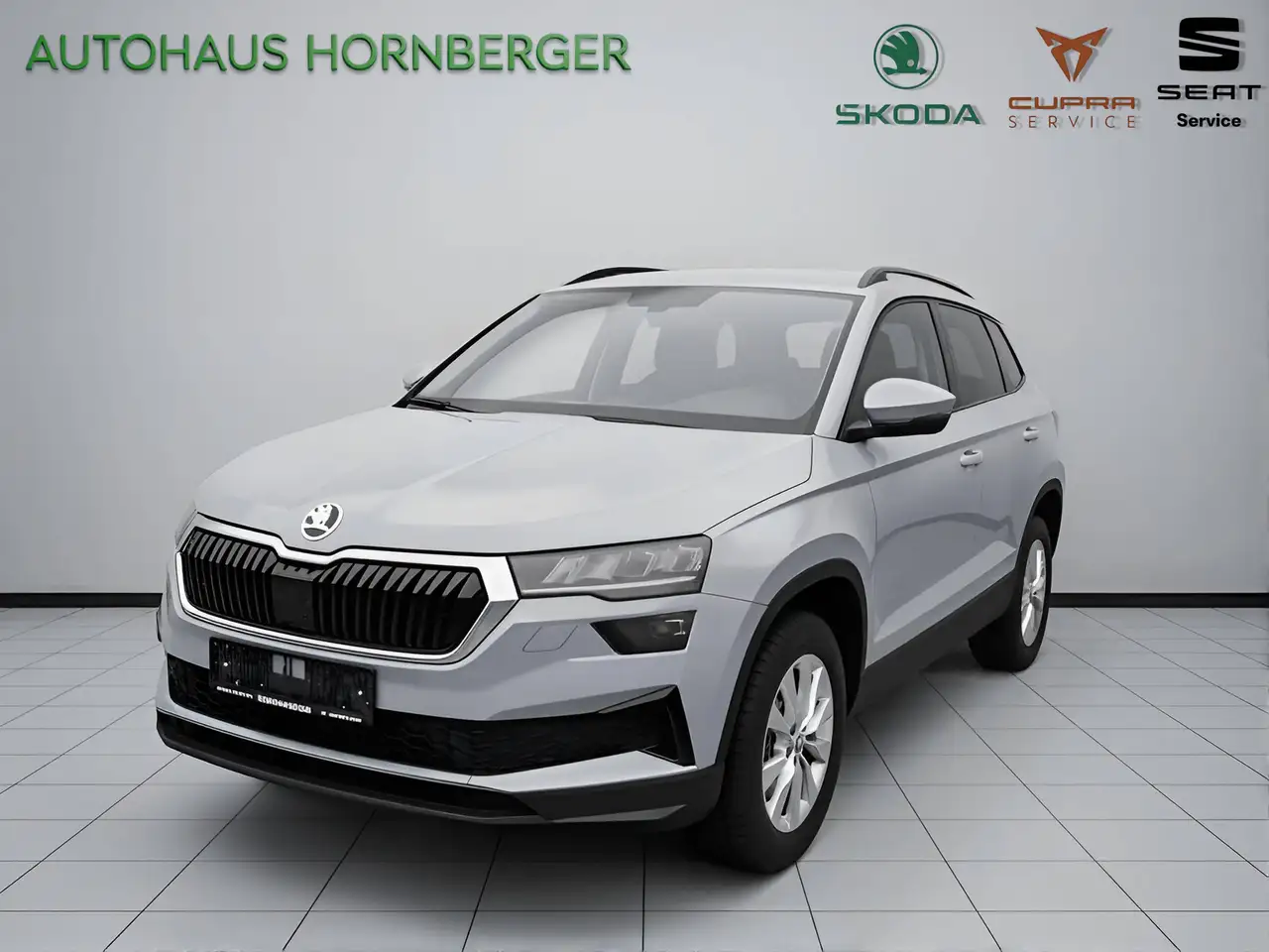 Skoda Karoq Ambition 1.5TSI 150PS NAVI LED CarPlay Tempomat 16" Alufelgen Climatronic PDC hinten Scheinwerferreinigungsanlage — photo 1 of 17