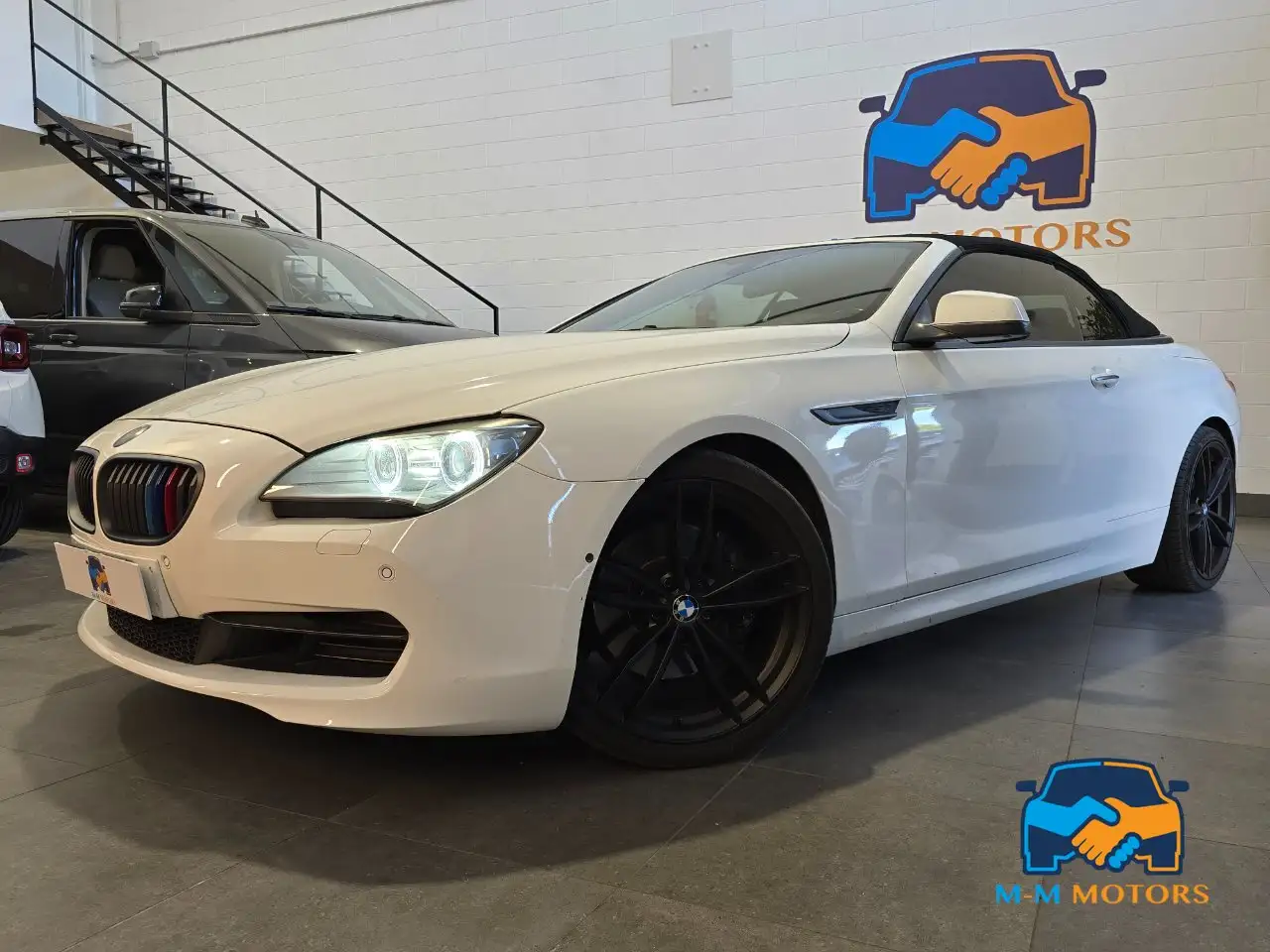 BMW 640 i Cabrio Futura auto — photo 1 of 15