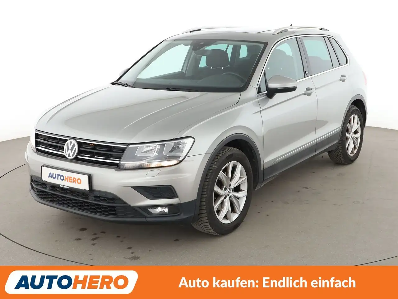 Volkswagen Tiguan 1.4 TSI ACT Comfortline BMT*NAVI*PDC*SHZ* — photo 1 of 29