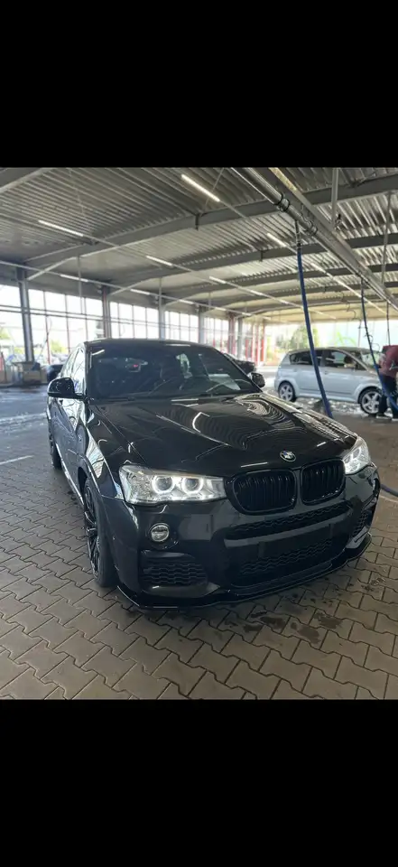 BMW X4 M 40i Deutsch Unfallfrei — photo 1 of 11