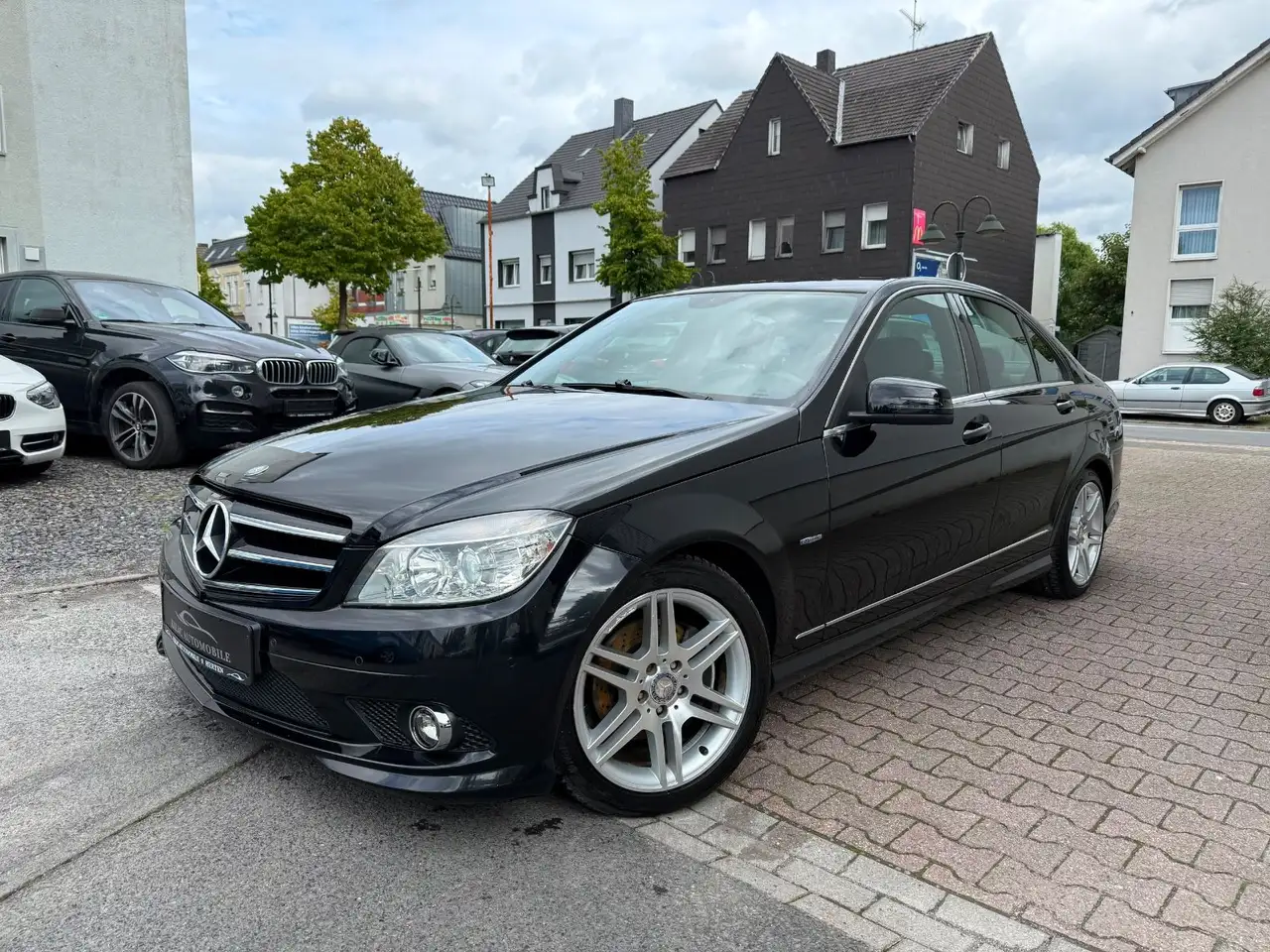 Mercedes-Benz C 180 CGI AMG BlueEfficiency 2.Hand*Leder*Garant — photo 1 of 25