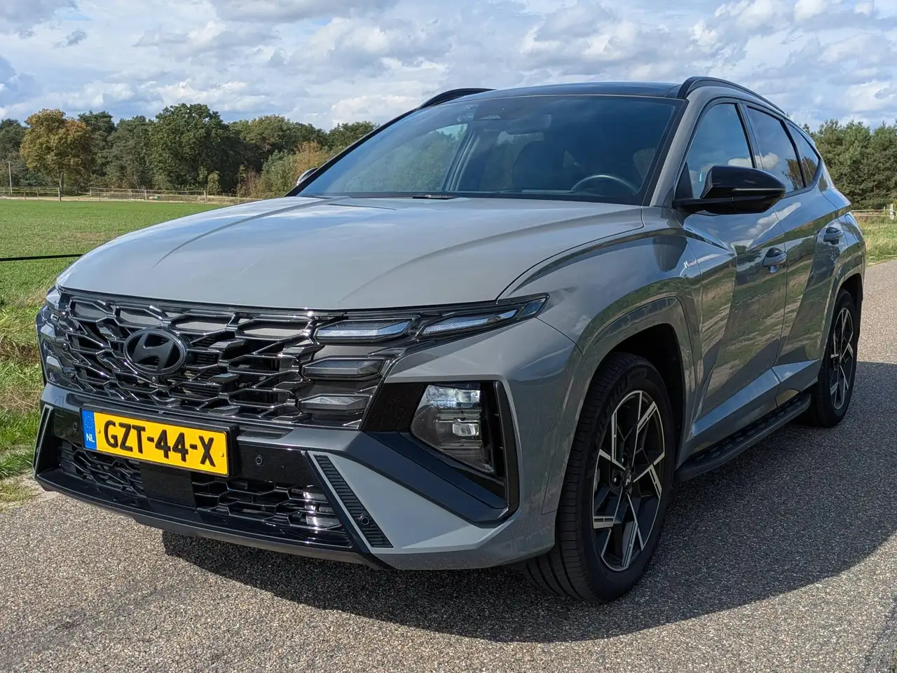 Hyundai TUCSON 1.6 T-GDI N Line Sky plug-inhybride wegens auto van de zaak | Keramische Coating | Sublieme Liefhebbersauto! — photo 1 of 40